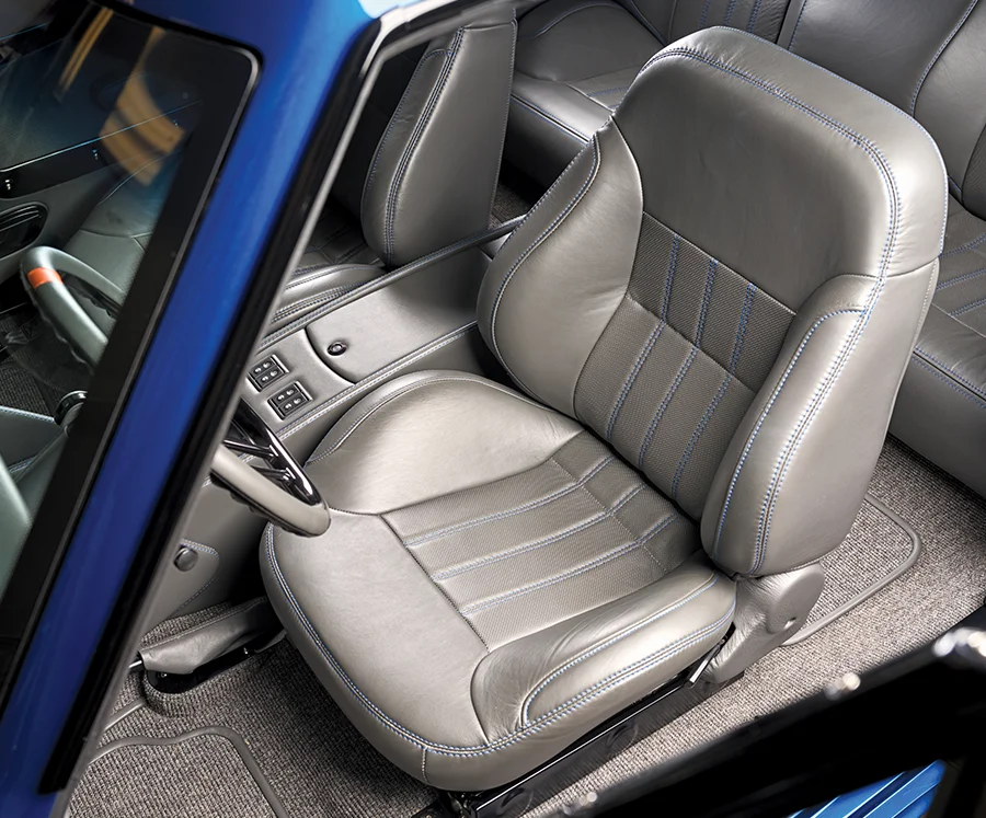 1966 Chevrolet Nova custom gray leather seats with blue stitching and bolstered design