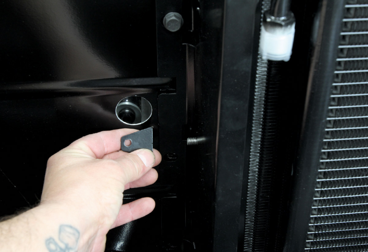 Installing a mounting bracket near the radiator