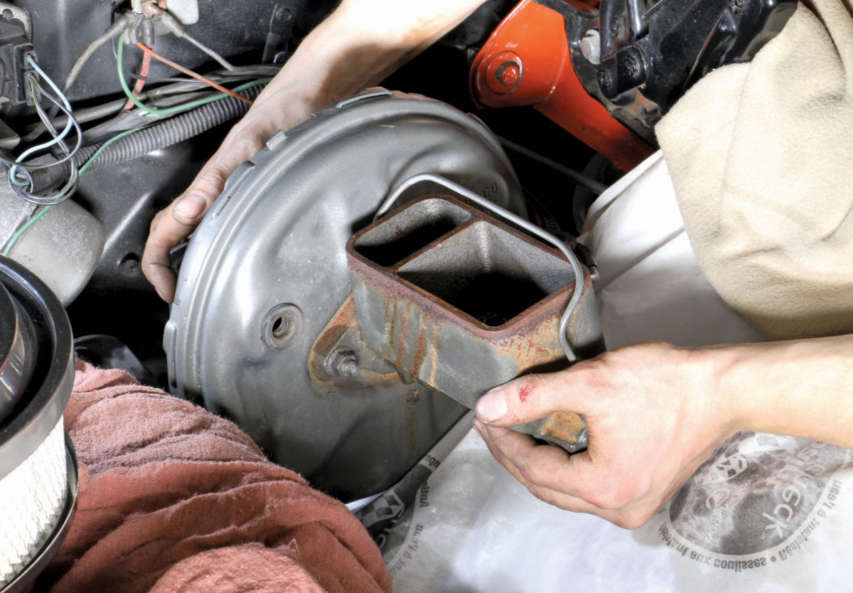 Removing the old brake booster from the firewall