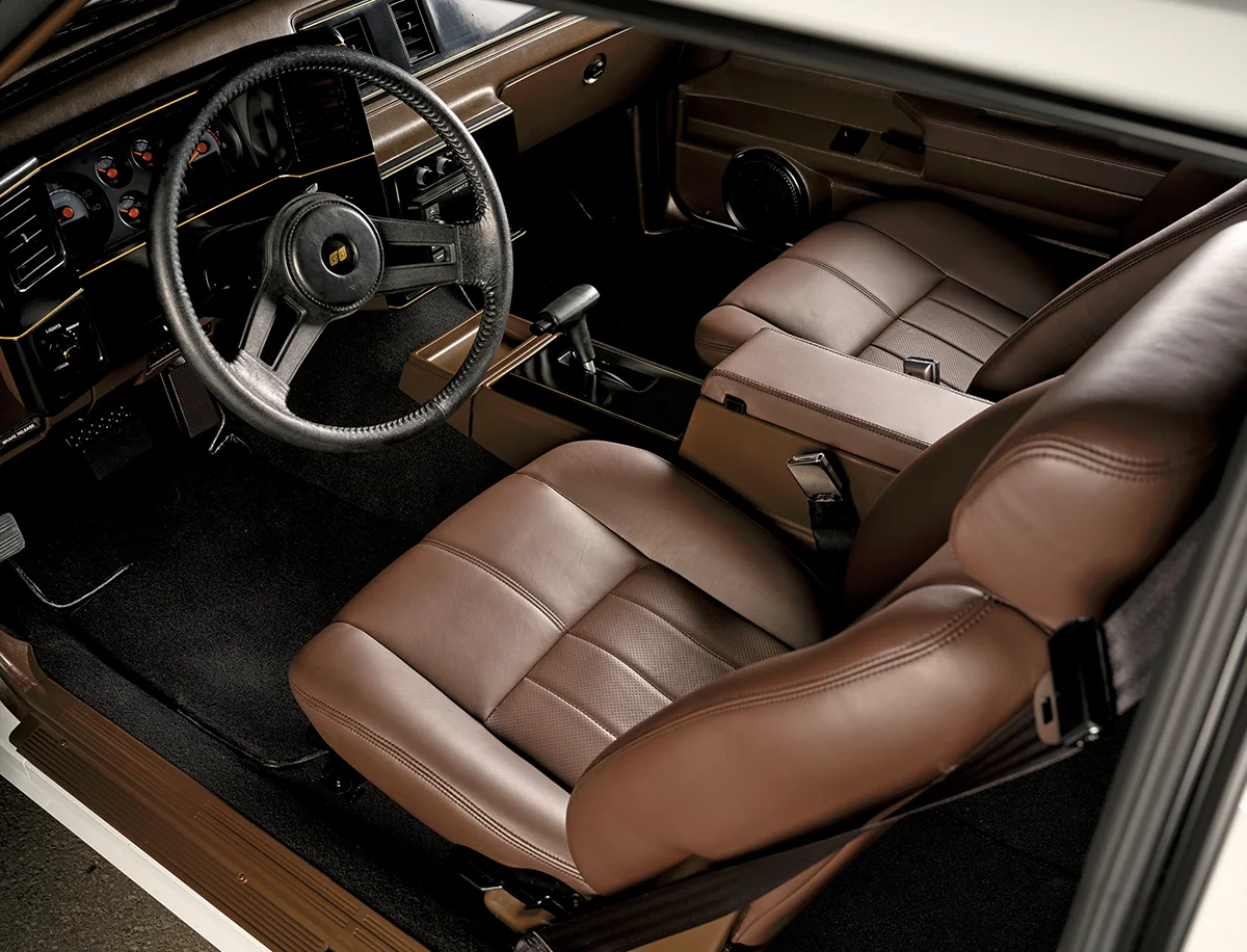 1987 Monte Carlo interior with two-tone brown leather seats and factory-style SS steering wheel