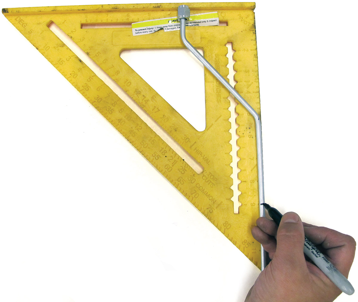 Using a speed square to precisely measure and mark brake line bends before fabrication