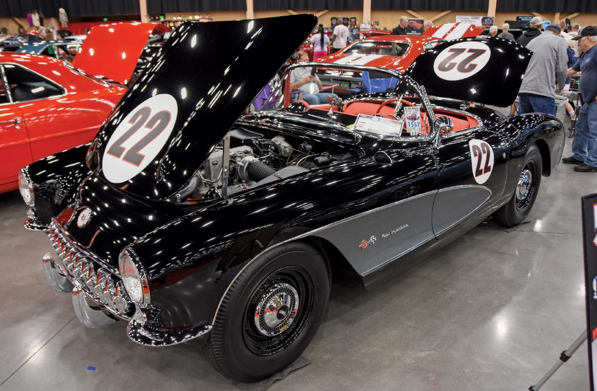 1957 Chevrolet Corvette race replica, black and silver two-tone with hood numbers and retro wheels
