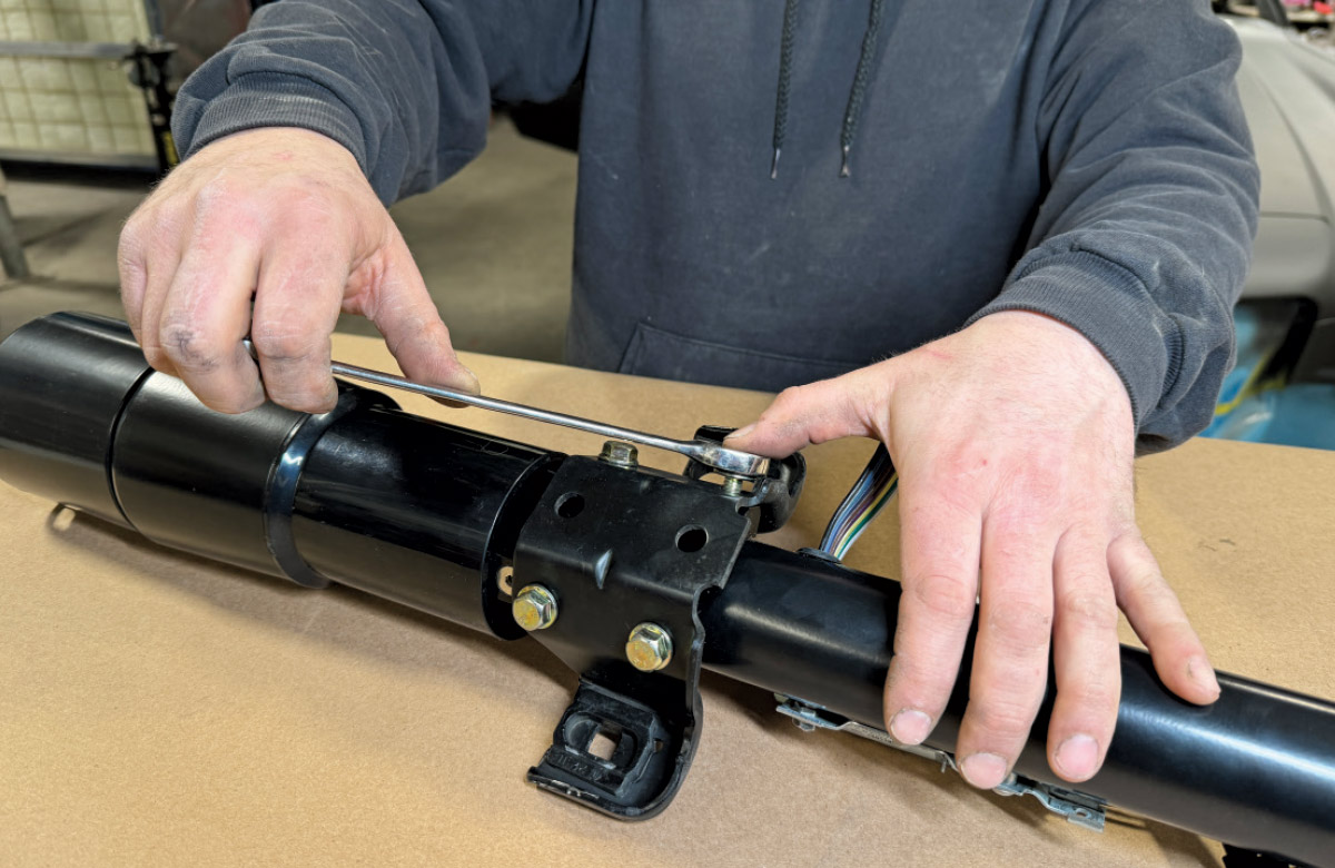 1971 Camaro steering column bracket being torqued to spec during final assembly
