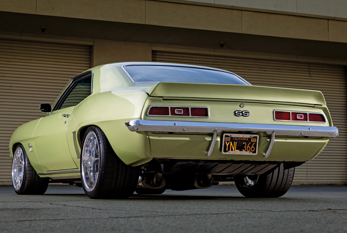 1969 Chevy Camaro SS rear angle highlighting custom exhaust and widened tires