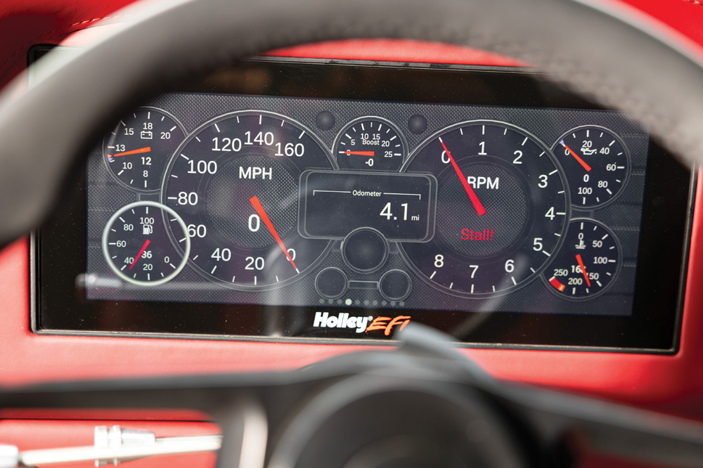 1966 Chevy Nova Holley EFI digital dash showing boost and performance data