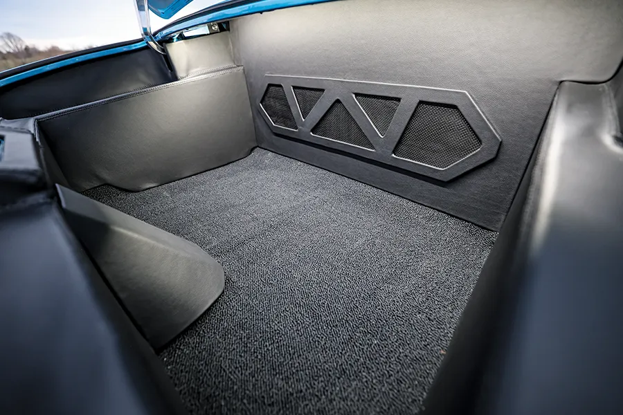 1968 Camaro trunk interior with custom trim and carpet