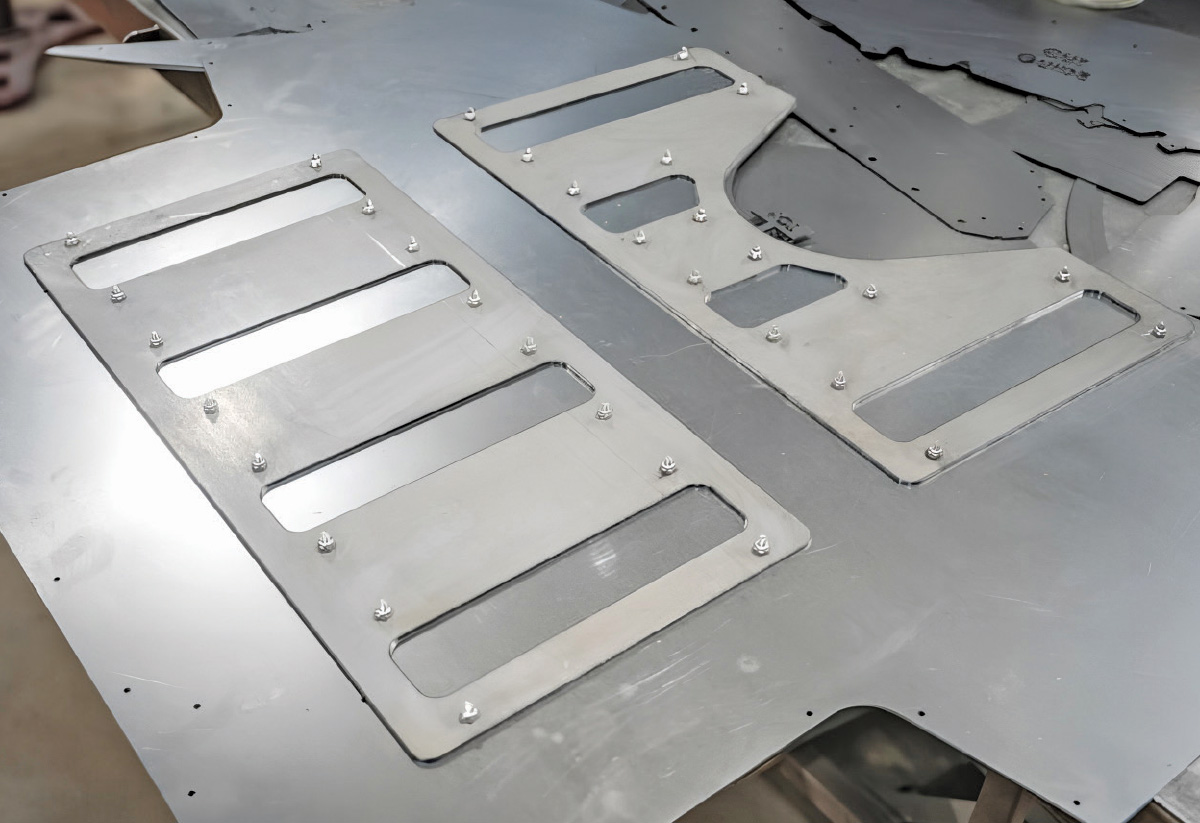 1968 Camaro sheetmetal panel prepped with bead-rolled vented inserts and bolted mockup