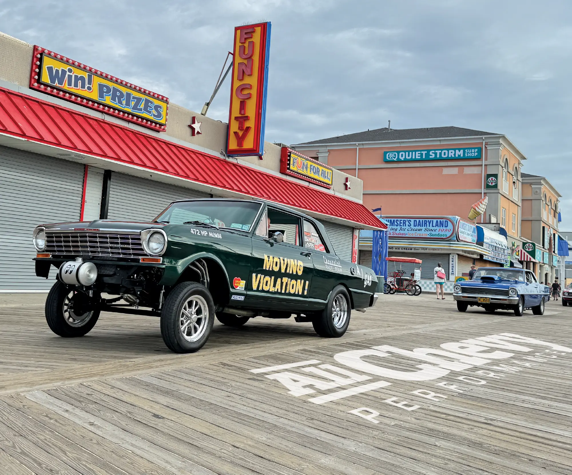 1966 Chevy Nova gasser Moving Violation on the boardwalk with high front lift and straight-axle stance