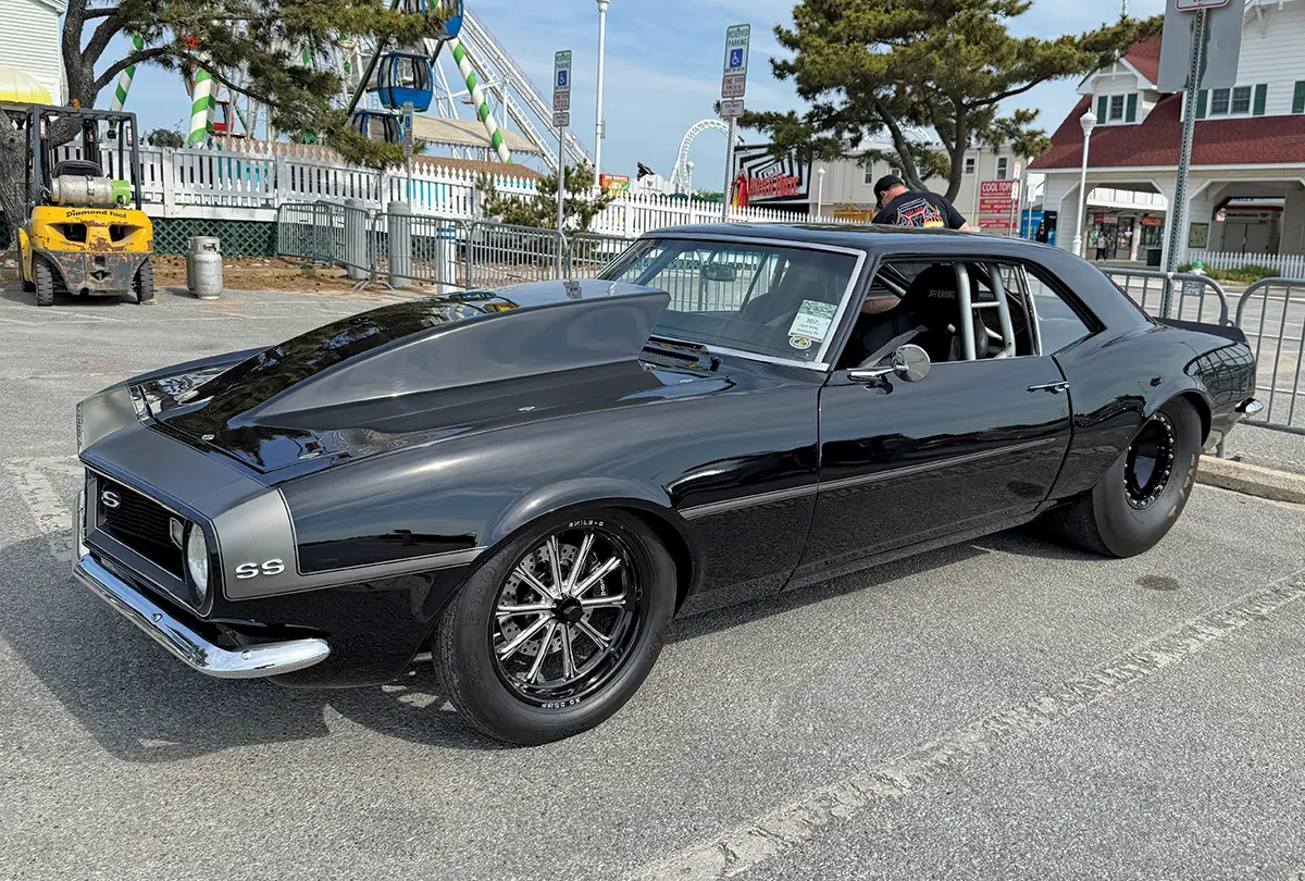 1968 Chevy Camaro SS drag build in gloss black with beadlock wheels and parachute setup