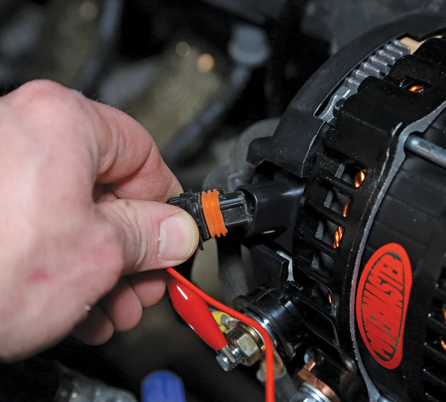 Powermaster alternator 2-pin connector engagement confirming signal wire fit