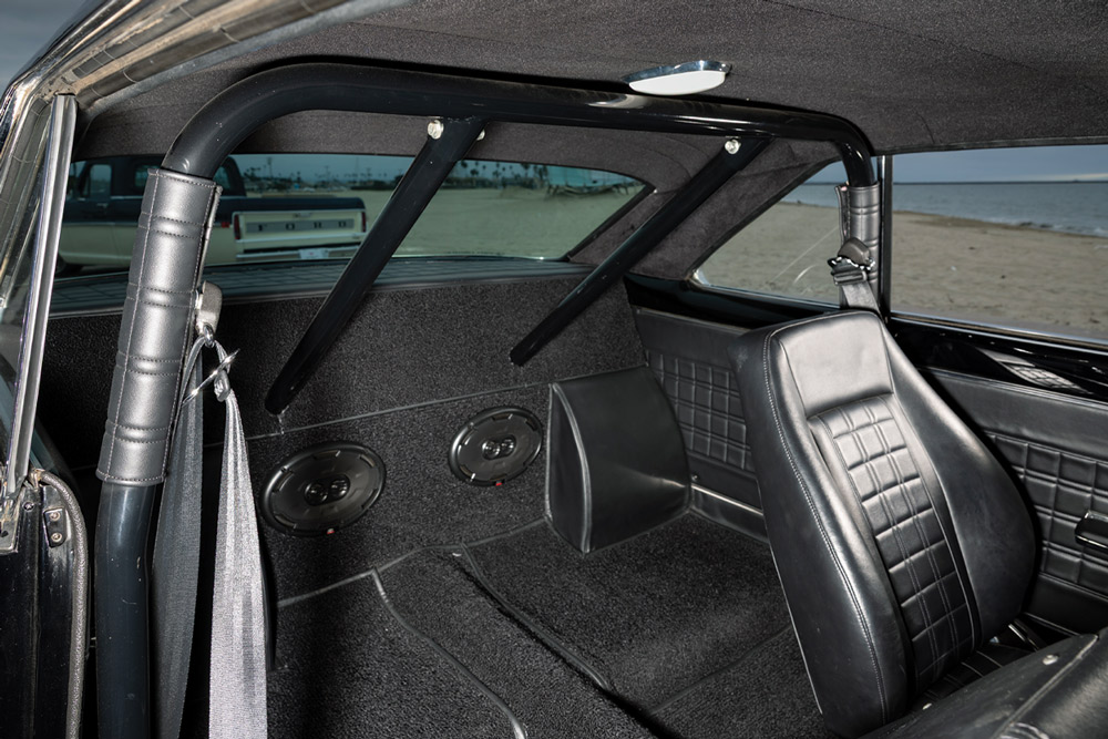 1967 Chevy Nova rear seat delete cage speakers drag interior beach view