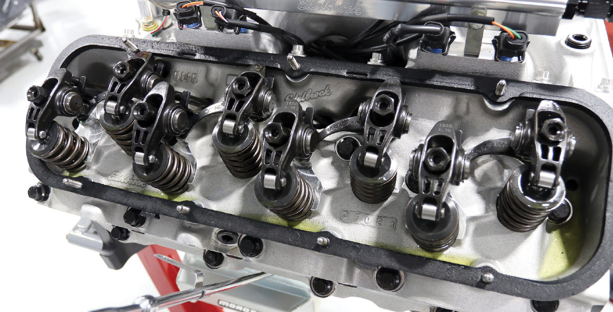 Close-up of Edelbrock aluminum heads with roller rocker arms and dual valve springs
