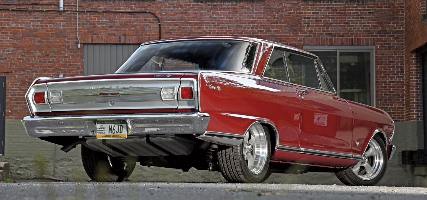 1965 Chevy Nova low rear shot staggered wheels mini tubbed street build stance