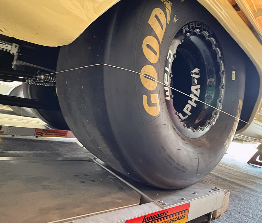 rear slick on longacre scale with alignment string for thrust check