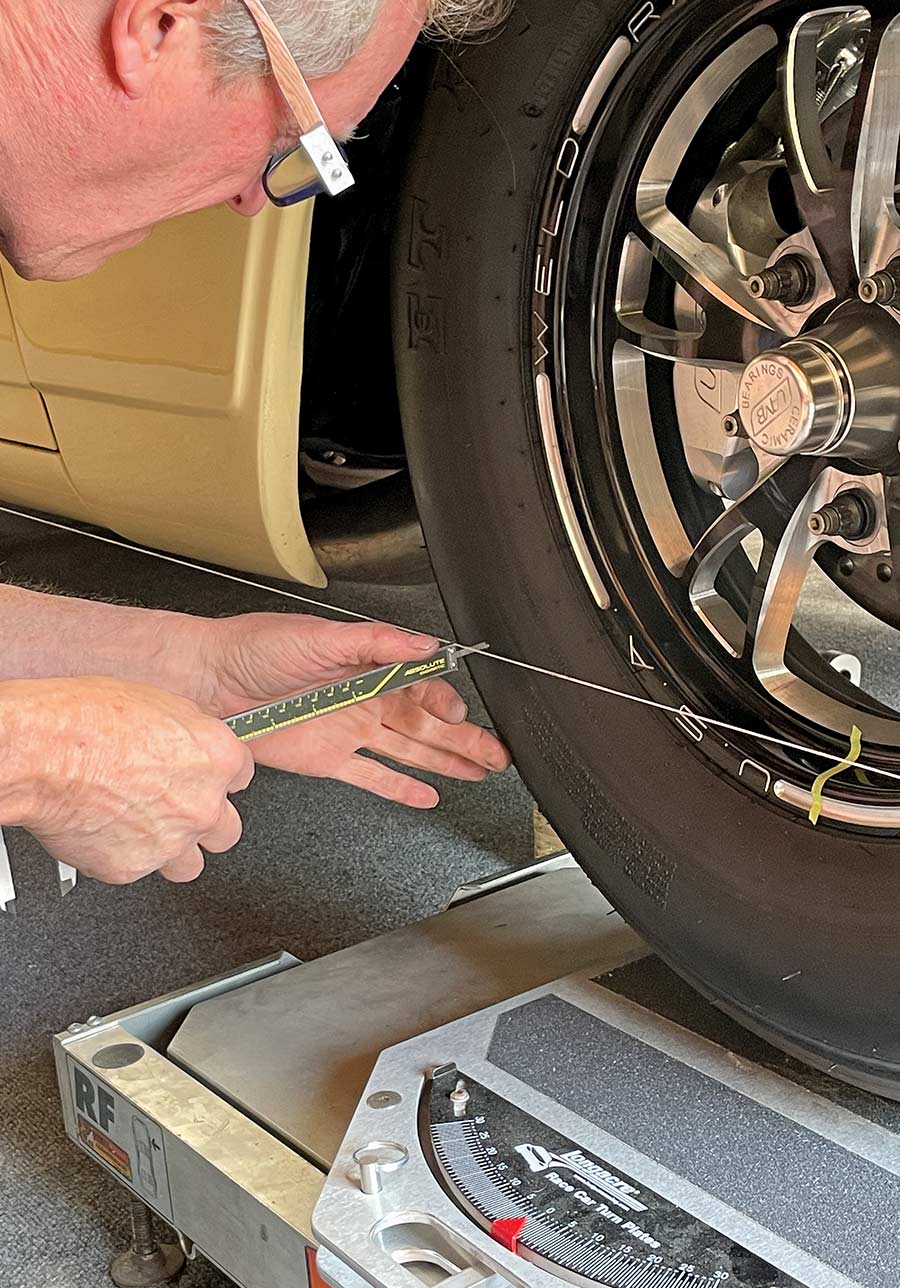 caliper used to measure toe distance from string to front tire