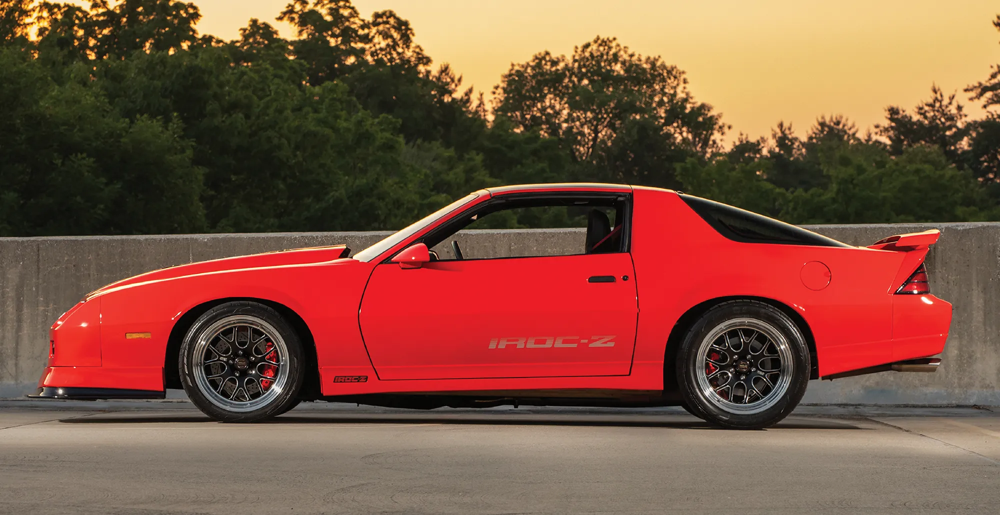 1988 IROC-Z Camaro profile shot lowered stance graphite wheels red Brembo brakes