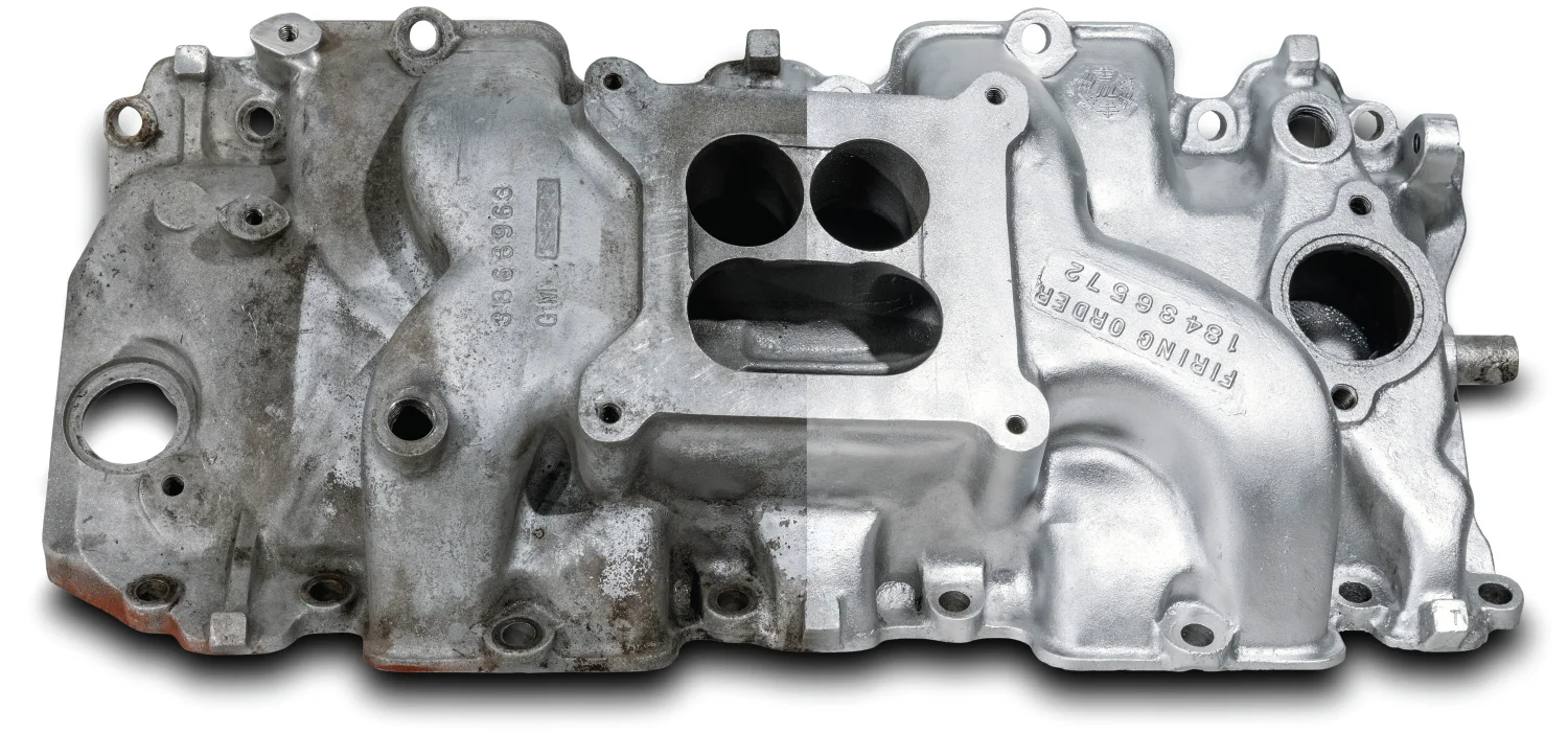 aluminum intake manifold before and after vapor blasting restoration