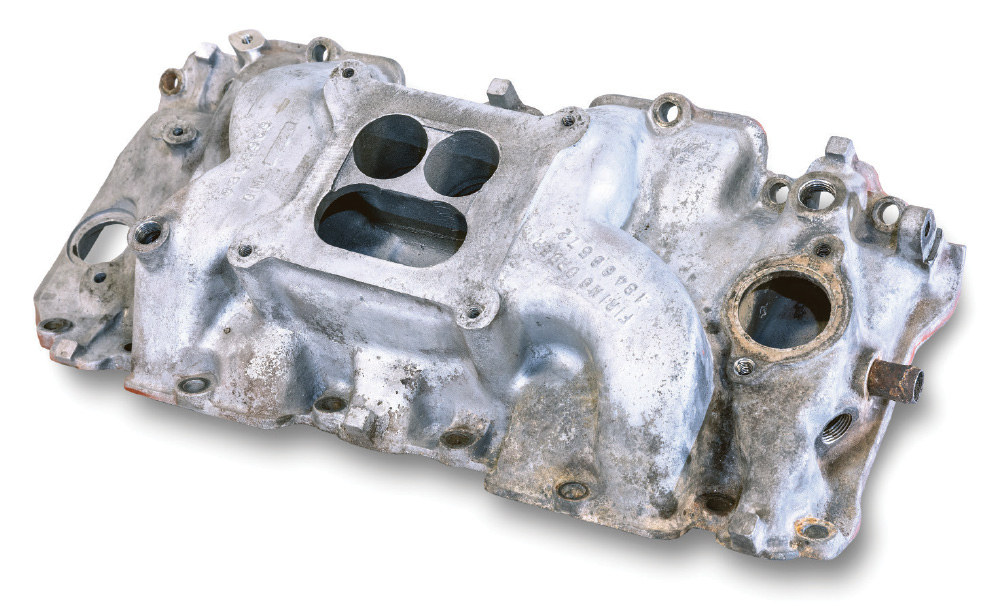 corroded aluminum intake manifold carb flange and runners