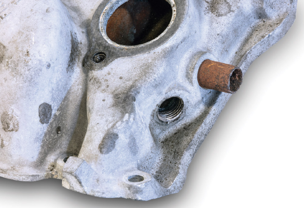rusted heater hose fitting on intake manifold