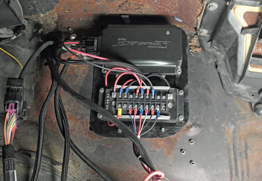 Holley Sniper EFI control box and fuse panel mounted inside vehicle cabin