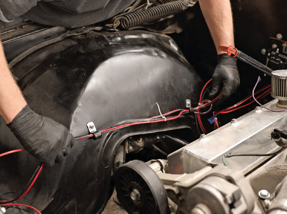 Engine bay wiring layout for Sniper EFI system using split loom and cable mounts