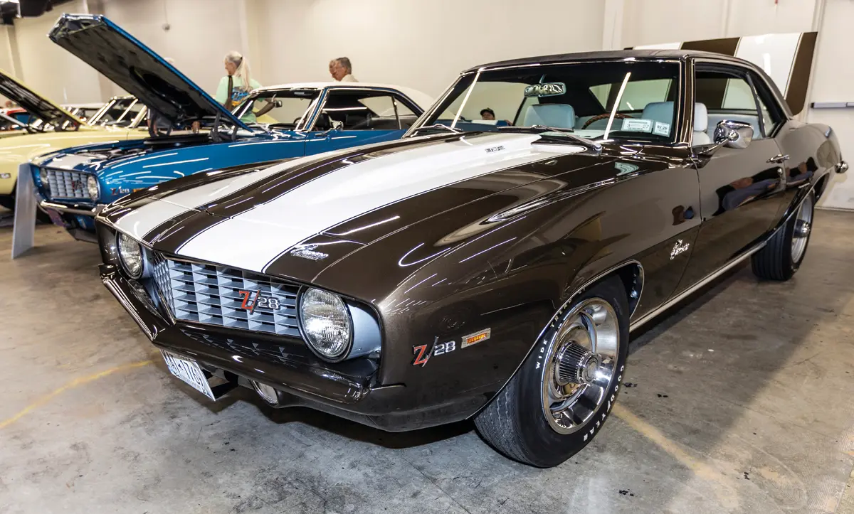 1969 Camaro Z28 black with white stripes chambered exhaust rally wheels