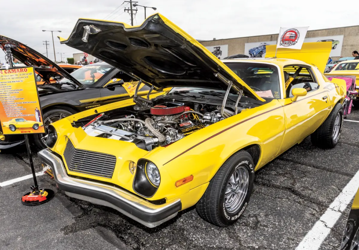 1974 Camaro yellow paint chrome engine bay Cragar SS wheels