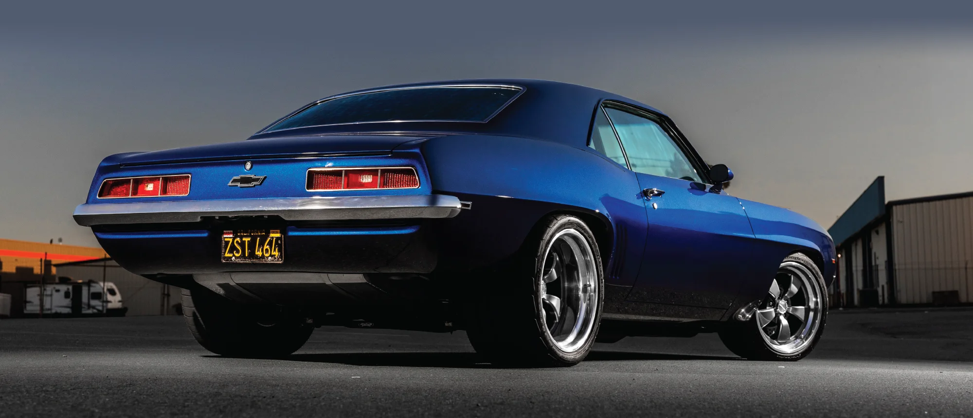 1969 Chevy Camaro rear quarter black plate chrome trim dual exhaust