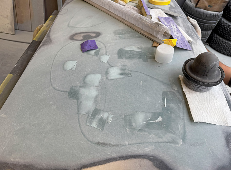 1963 Chevy Nova door skin in filler work, block sanding stage