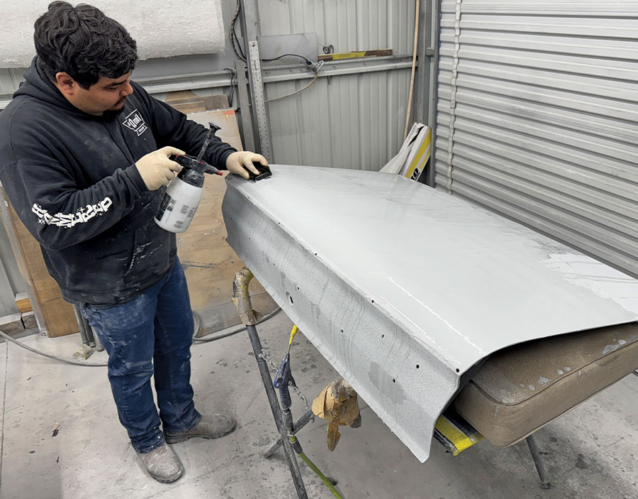 Wet sanding 1963 Chevy Nova door with spray bottle