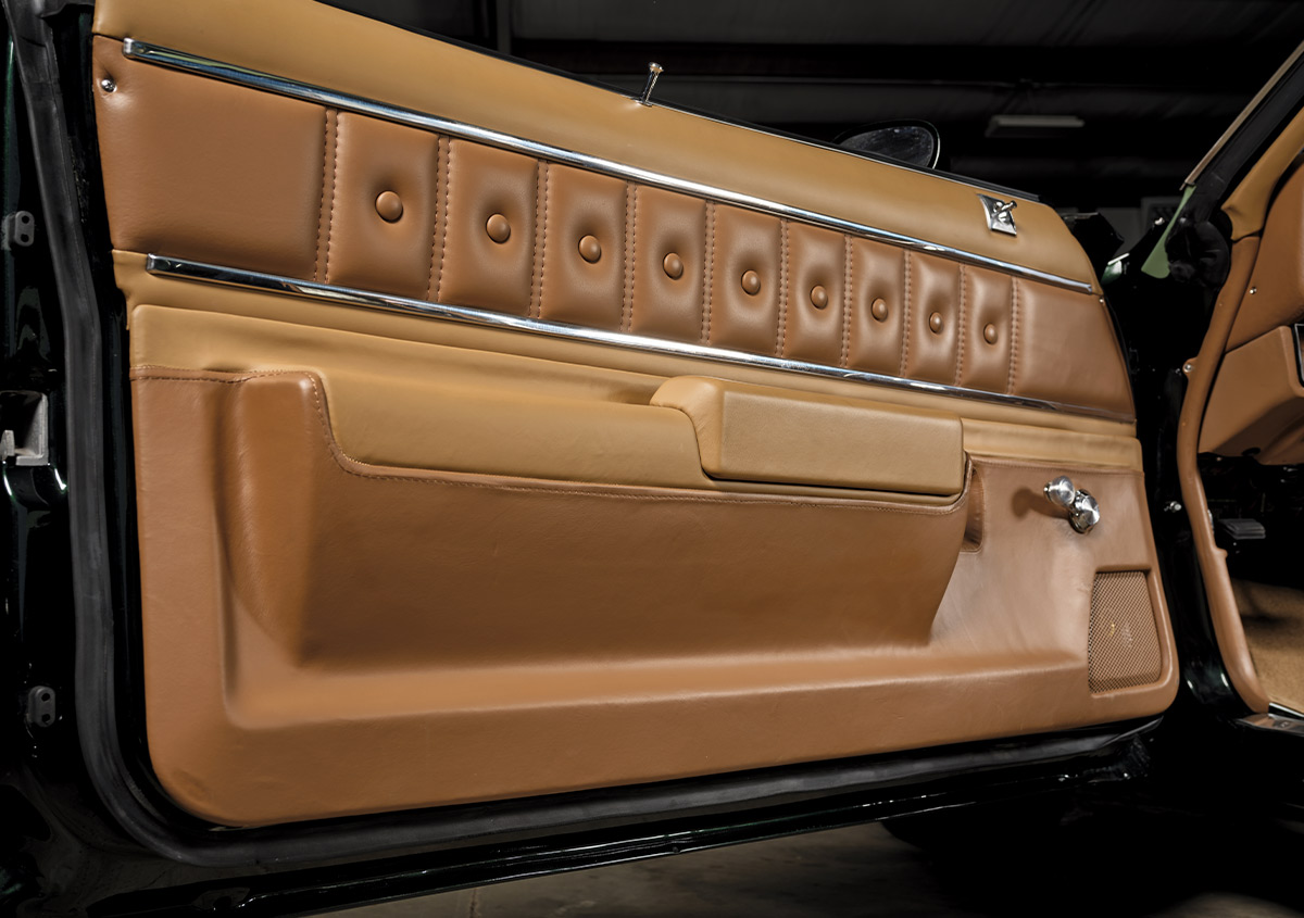 1977 Chevy Malibu driver door panel tan vinyl chrome trim