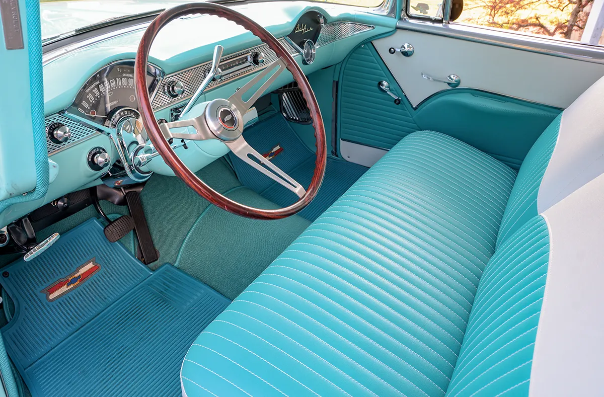 1955 Chevy Bel Air interior bench seat turquoise white two-tone dash factory trim