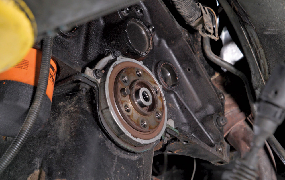 Close-up view of the rear of an engine block showing the pilot bearing where the automatic transmission was removed.