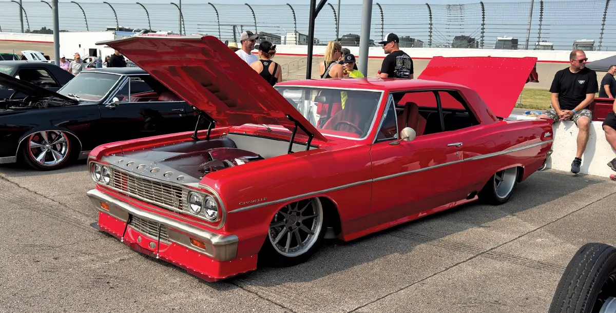 1964 Chevrolet Chevelle – bright red, race-style front splitter, hood open