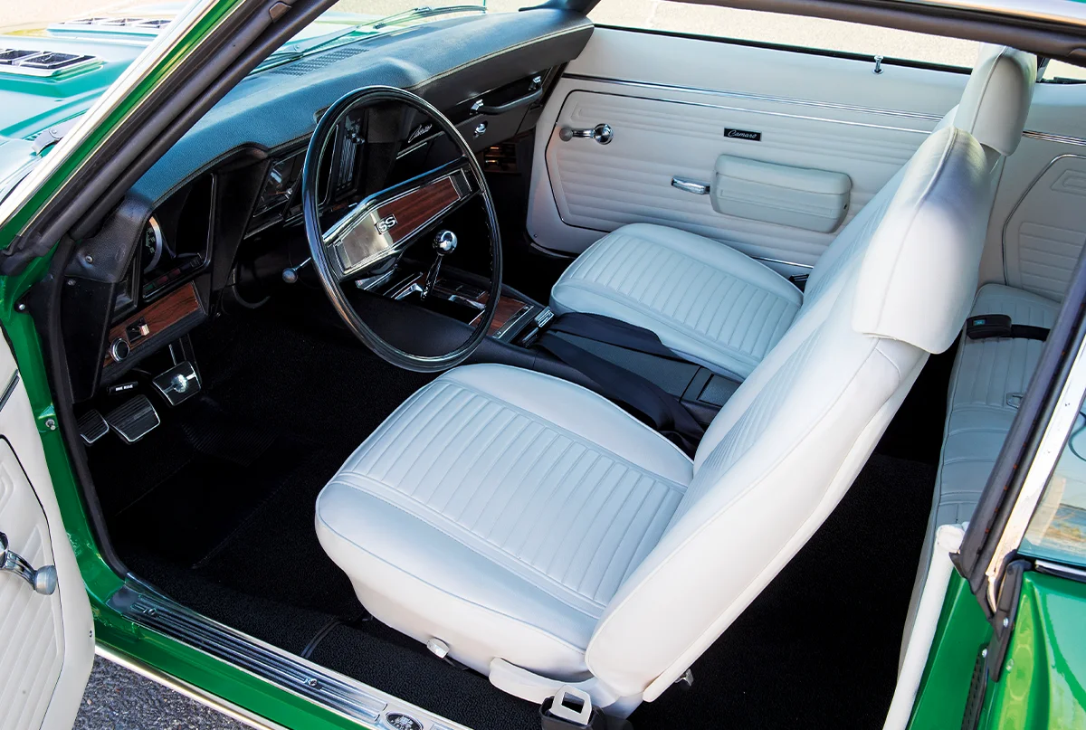 1969 Camaro SS interior white vinyl seats horseshoe shifter wood trim dash