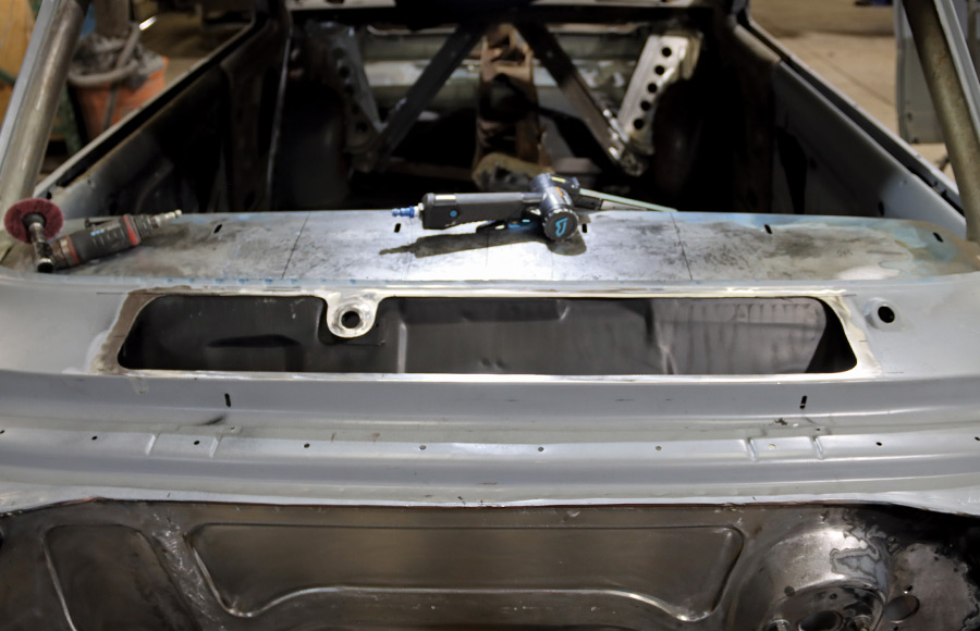 1967 Nova cowl vent cut out revealing fresh air intake cavity and exposed dash structure