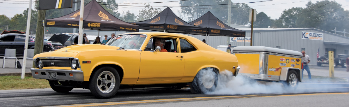 1970 Nova yellow burnout drag trailer Aces EFI backdrop drag-and-drive setup