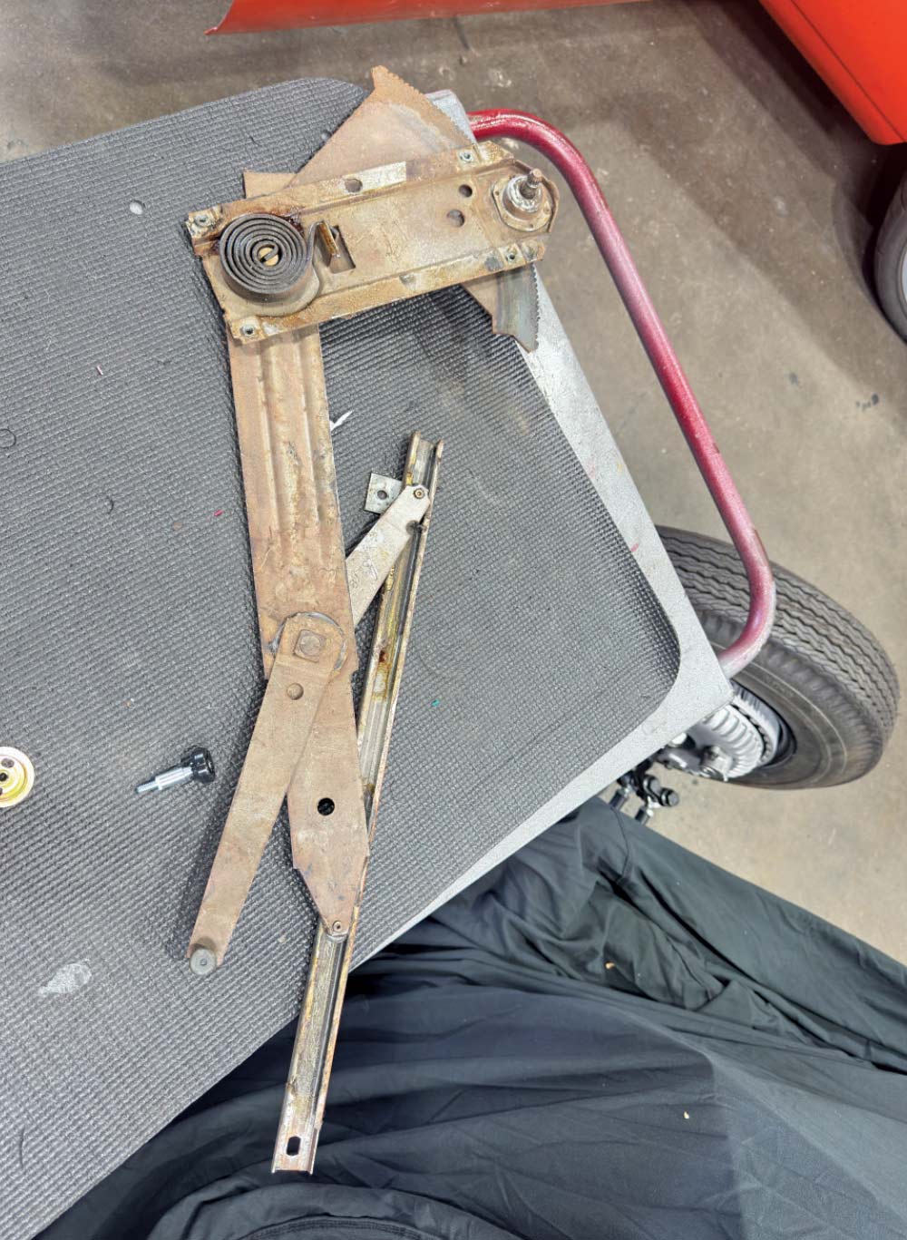 1971 camaro original window regulator removed placed on bench
