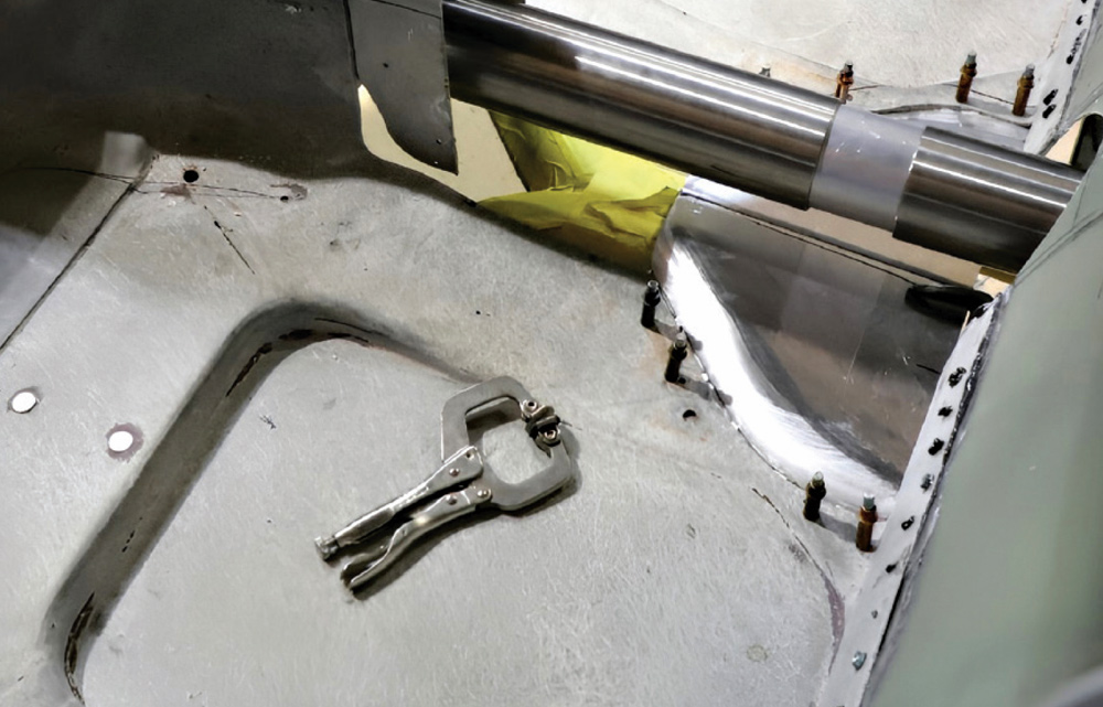 1965 Corvette driveshaft tunnel mock up with polished panels and cleco fasteners
