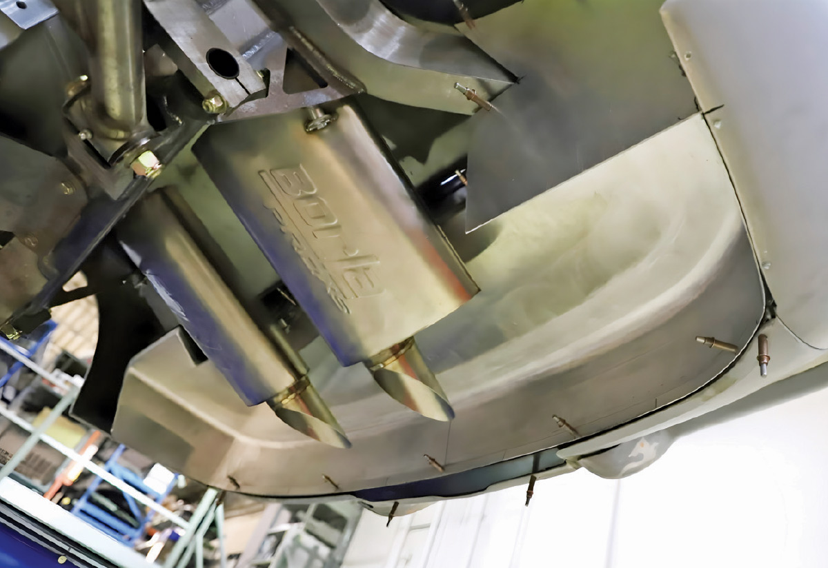 View of installed Borla ProXS mufflers under the rear of the car.
