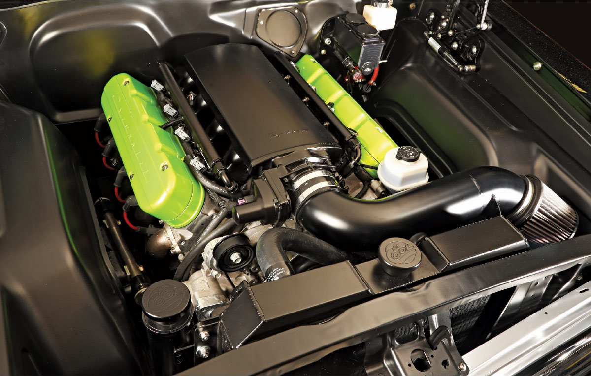 Detailed view of high-performance LS engine with green valve covers.