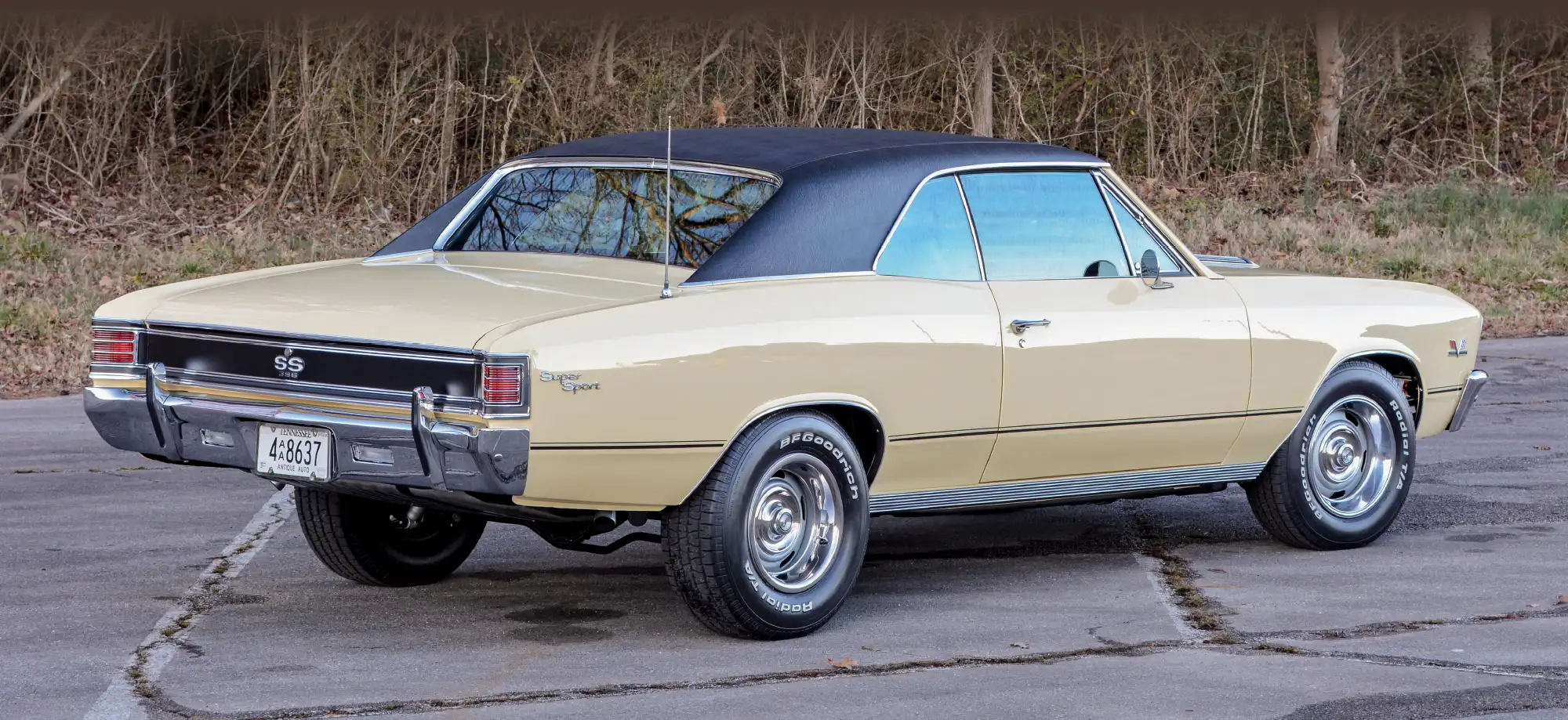 Rear three-quarter view of a cream Chevrolet Chevelle SS showing the chrome bumper, taillights, and SS 396 badging.