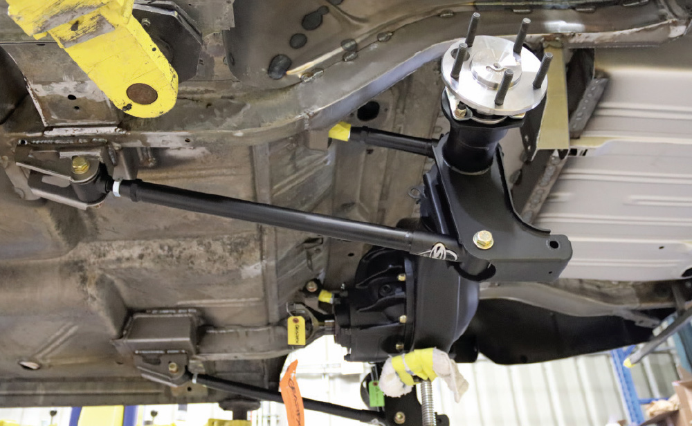 3-link or 4-link coilover system designed to replace traditional leaf springs