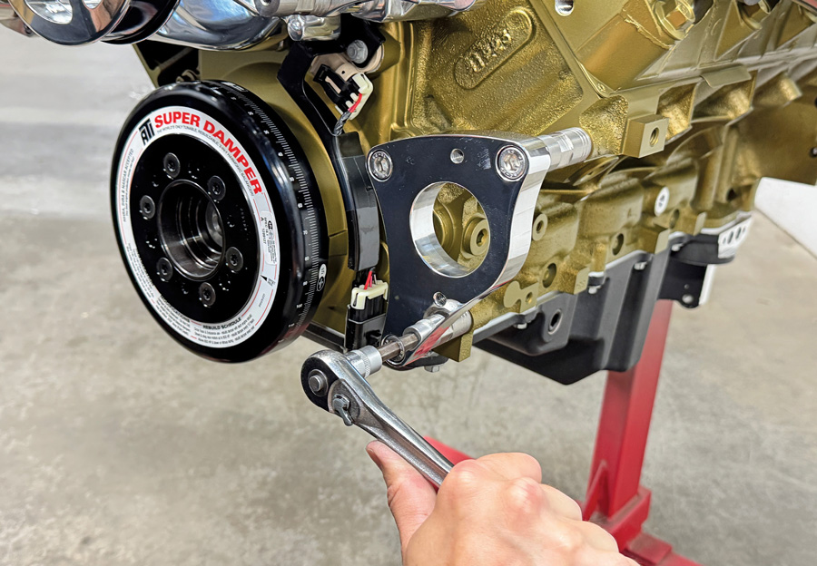 Securing the power steering bracket to the block