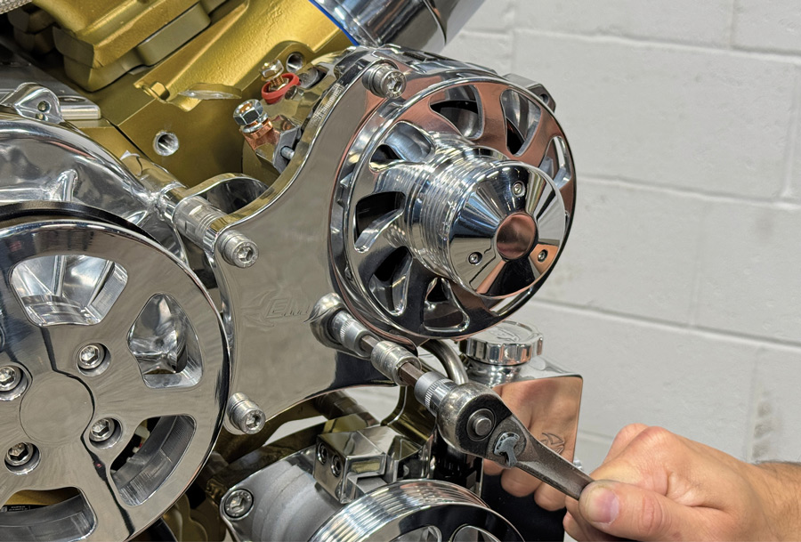 Bolting the alternator into the mounting bracket