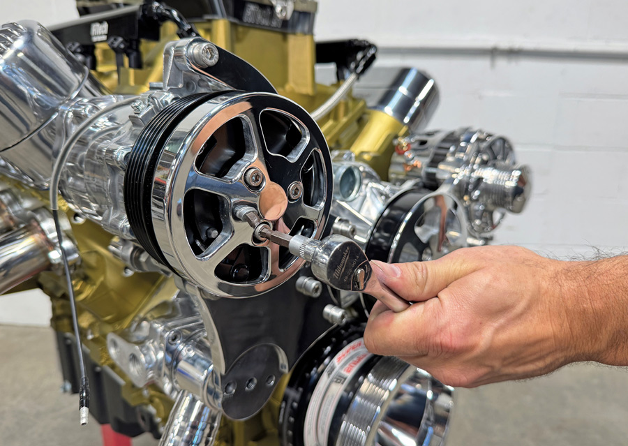 Attaching the compressor cover to the pulley