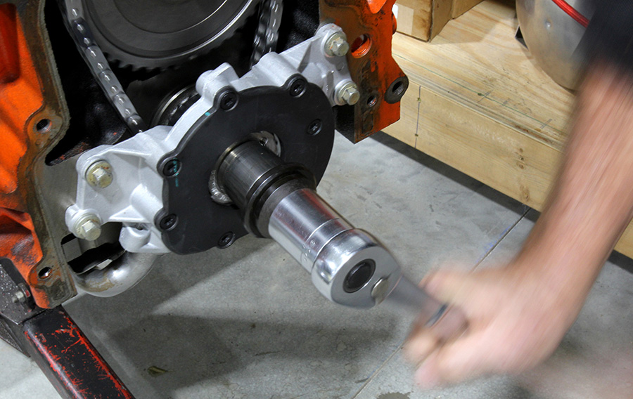 Aligning oil pump onto crankshaft.