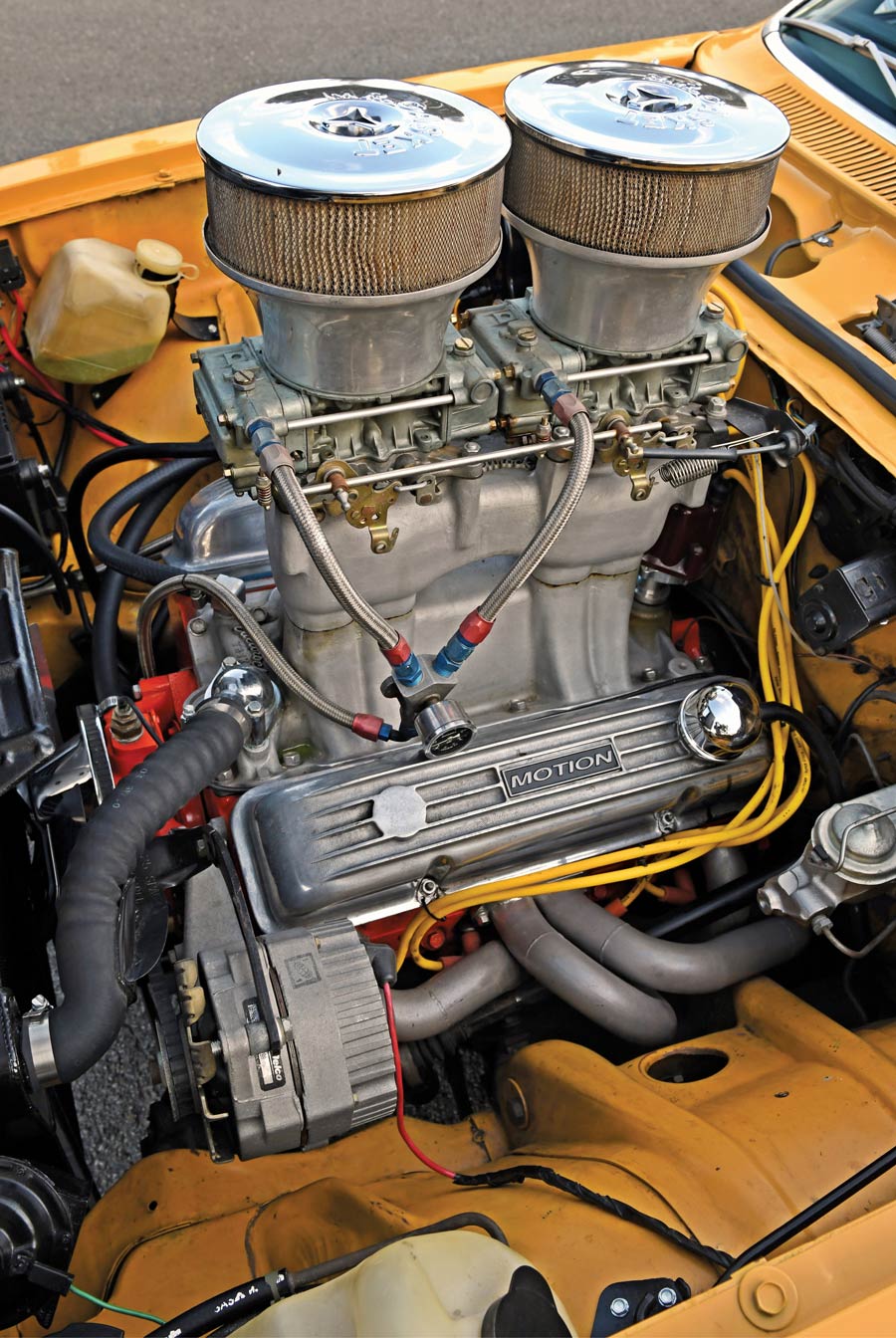 Chevy 350 engine with tunnel ram intake and dual carburetors