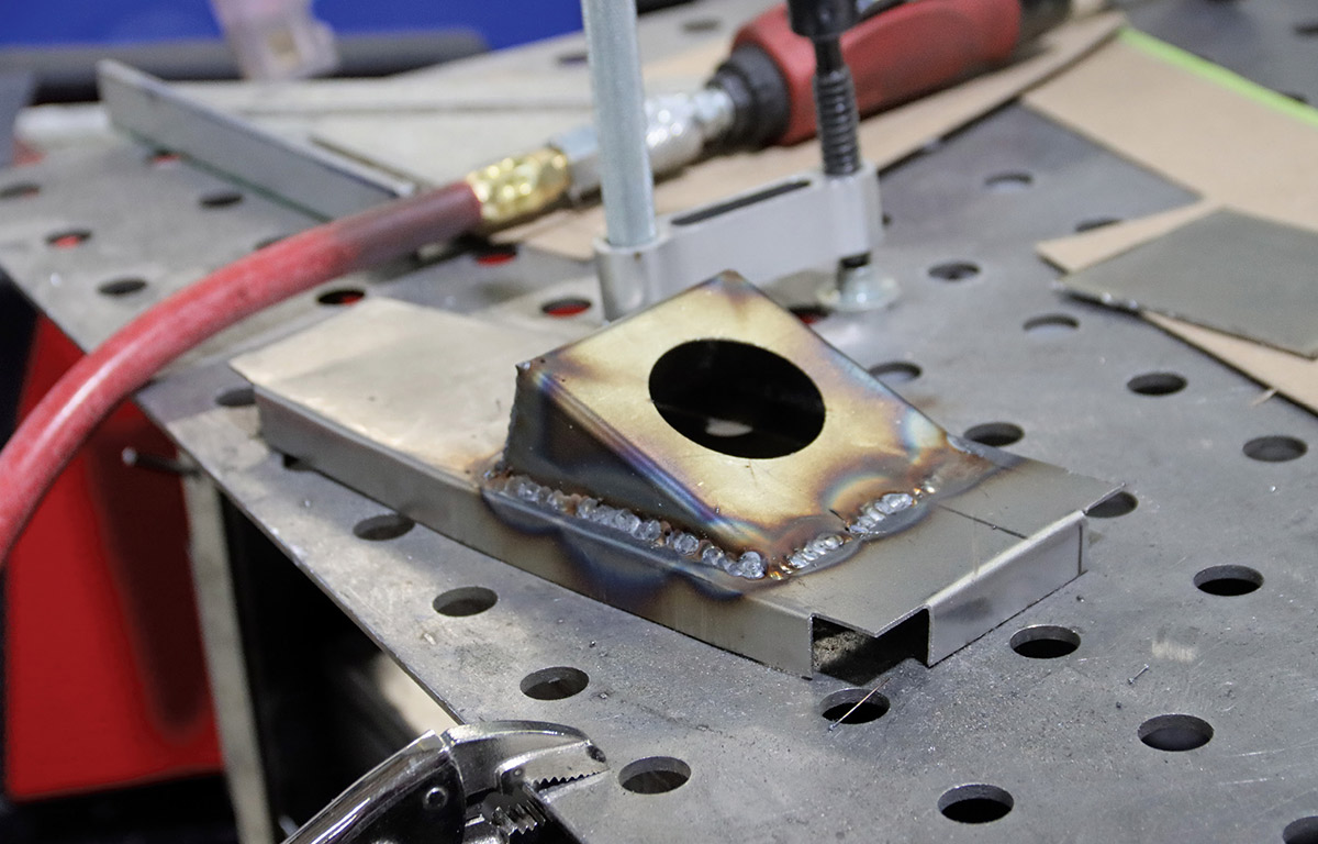 Welded recessed box on metal mounting plate.