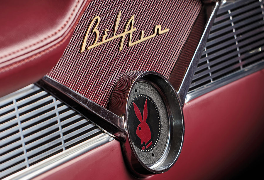 Detail of factory dashboard clock with Playboy bunny logo.